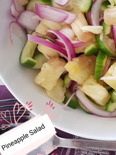 A picture of Pineapple Salad (best served with tomato rice).