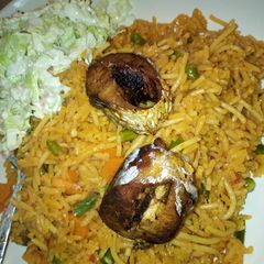 JOLLOF Rice with fish and coslow A picture of JOLLOF Rice with fish and coslow.