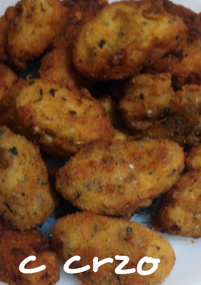 Una foto de Croquetas de setas de pie azul