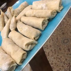 A picture of Samosa/spring rolls wrap.