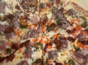 Una foto de pizza integral sin aceite