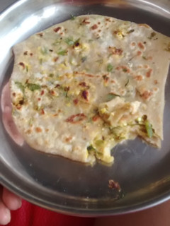 A picture of Parathas with paneer capsi.