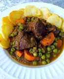Ternera en salsa de especias y guisantes
