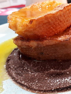 Una foto de Torrijas de coco y naranja al horno
