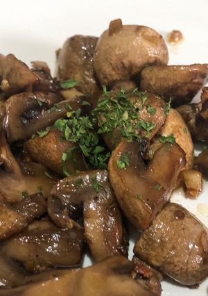 A picture of Sautéed mushroom with butter and soy sauce.