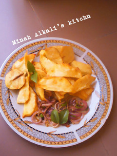 A picture of Sweet potatoes with onion source.