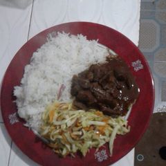 A picture of Maini with rice and cabbage.