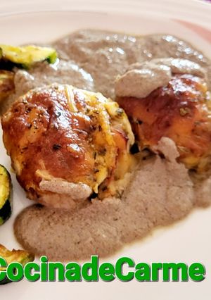 Una foto de Rollitos de solomillo gratinados rellenos de jamón y queso