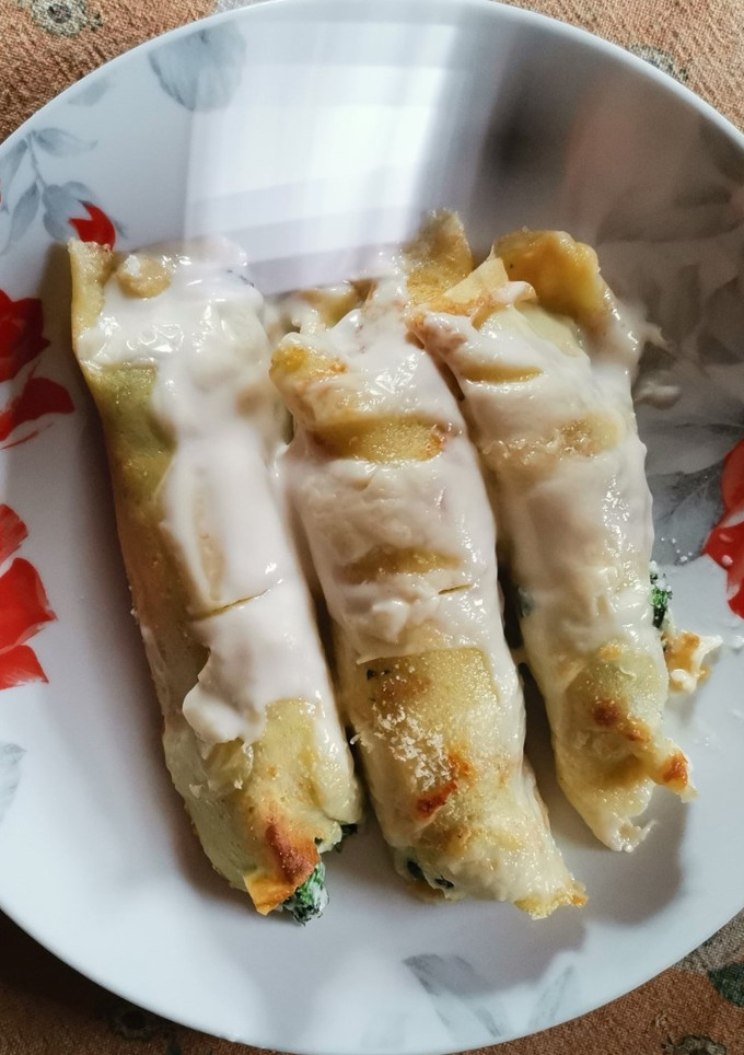 Una foto de Crepes ricotta y espinacas