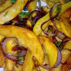 A picture of Easy Sauteéd marinated potato wedges.