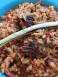 Arroz meloso de patas de cananas y costillas
