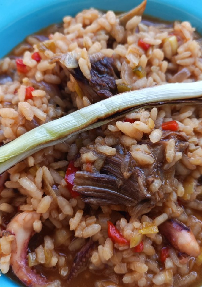 Una foto de Arroz meloso de patas de cananas y costillas