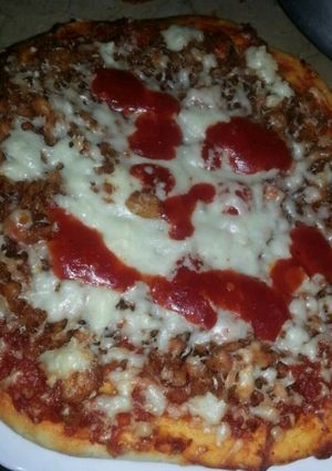A picture of Loaded Chicken tikka pizza.