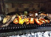 Una foto de choclo a la parrilla