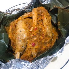 A picture of Ayam Betutu (Chicken in Balinese spices).