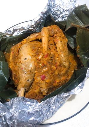 A picture of Ayam Betutu (Chicken in Balinese spices).