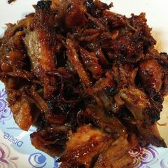 A picture of Barbecued leftover Tangerine pork.