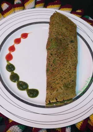 A picture of Oats Pesarattu/ Oats spinach Green Moong Dal Dosa /.