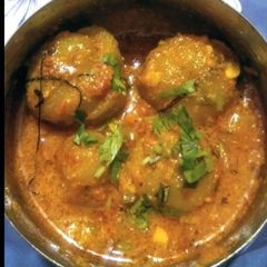 A picture of Stuffed Round Gourd (Katori Tinda).