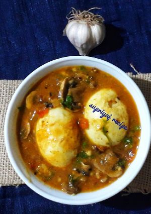 A picture of Mushroom egg curry.