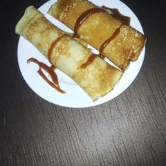 A picture of Crêpe with homemade caramel syrup.