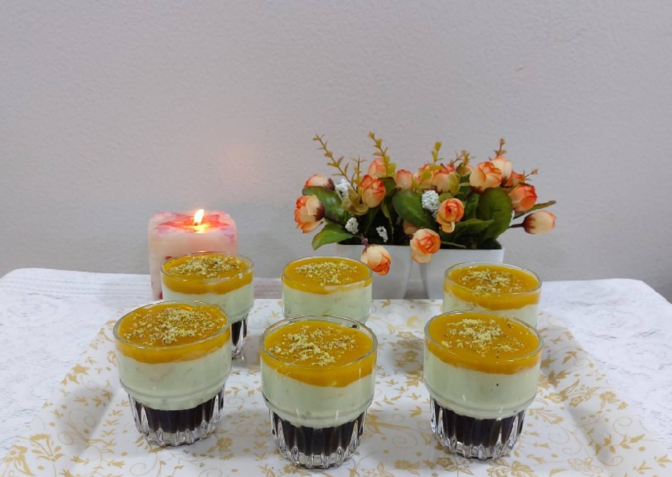 Fruit custard blackcurrant jelly with mango sauce