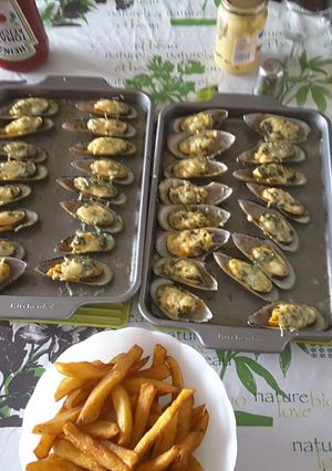 Une photo de Moules d'Espagne gratinées au fromage râpé