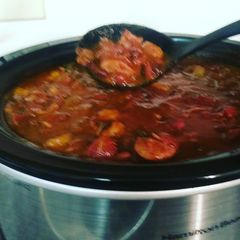 A picture of Red Beans & Rice w/ shrimp, chicken & sausage.