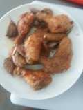 Alitas de pollo rebozadas en harina y huevo
