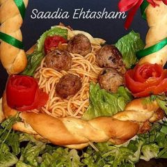 Red sauce meat 🍖 balls in bread 🍞 basket 🏀 A picture of Red sauce meat 🍖 balls in bread 🍞 basket 🏀.