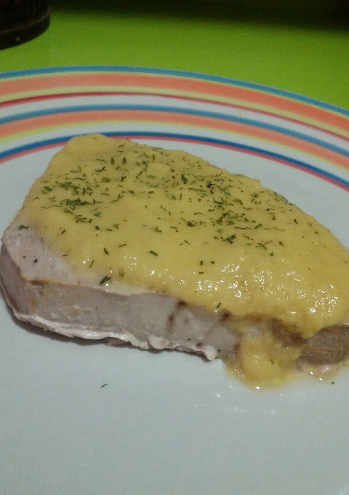 Una foto de Atún en salsa de cebolla