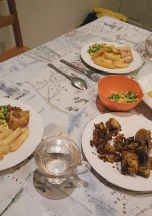 A picture of Salmon, Chips and Pea.