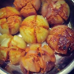 A picture of Fried small onion veg.