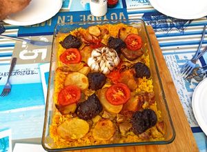 Una foto de Arrós al forn