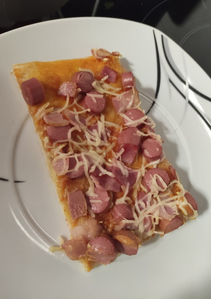 Una foto de Pizza hot dog