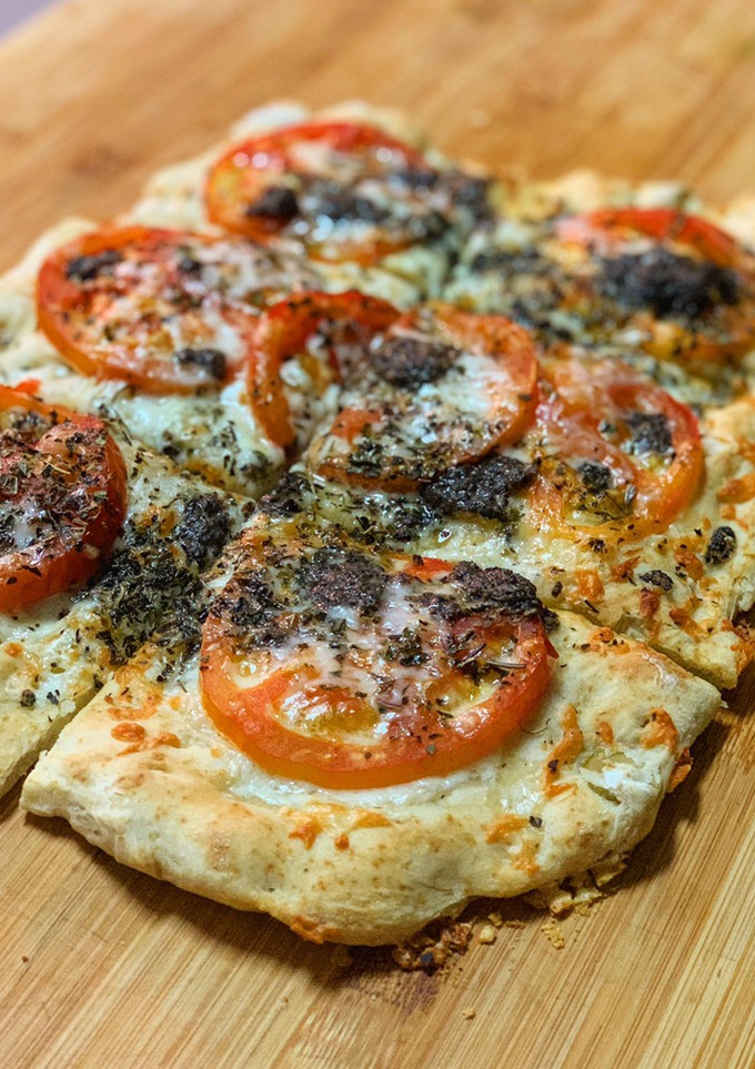 Una foto de Pizza margarita al tartufo