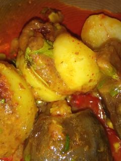 ભરેલા રીંગણા બટેટા નુ શાક રેસીપી મુખ્ય ફોટો