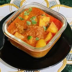 A picture of Aloo Posto Curry.