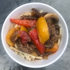 A picture of Pepper Steak with Kluski Noodles.