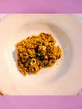 Risotto cremoso ai funghi, zafferano e nocciole