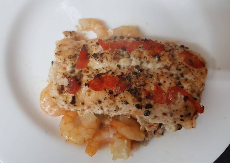 Step-by-Step Guide to Make Perfect My Chilli Garlic Salmon and king Prawn Bake