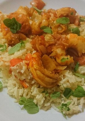 Una foto de Langostinos con Arroz de Coco