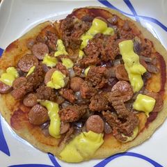 A picture of Pizza on pan.