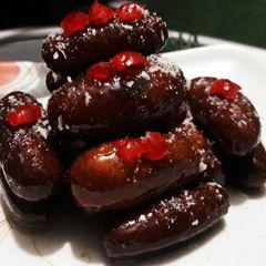 A picture of Gulab jamun from leftover roti.