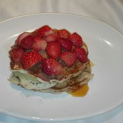 A picture of Glorious Fluffy Banana and strawberry pancakes.