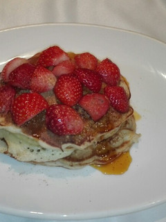 A picture of Glorious Fluffy Banana and strawberry pancakes.