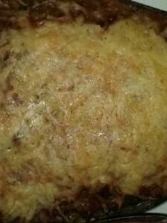 Una foto de Berenjenas al horno con carne picada y verduras
