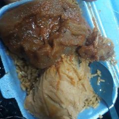 A picture of Jollof,moimoi and pomo.