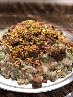 صورة لوصفة رز بالفول ملكي