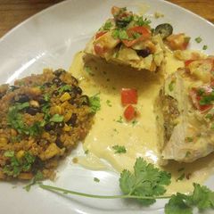 A picture of Quinoa Stuffed Chicken Breast with Cream Sauce.